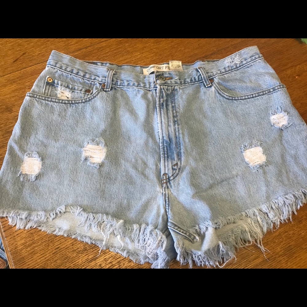 Levi 560 distressed high rise shorts